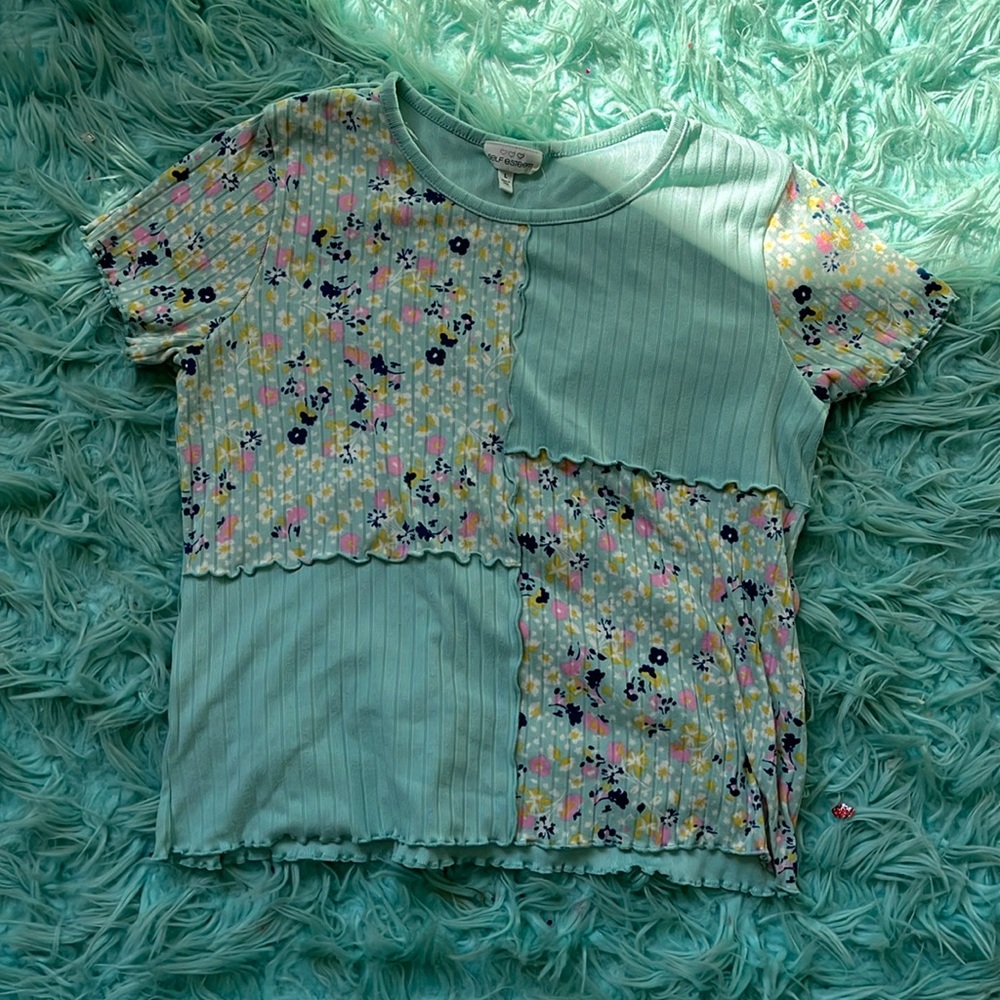 The beand is self esteem the size is a large and the color is a greenish blue